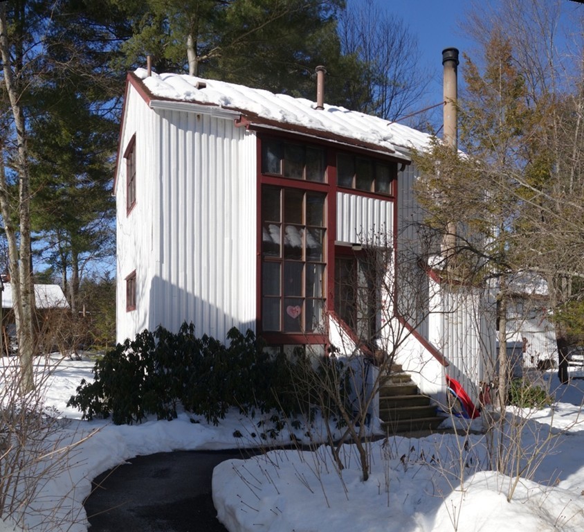 53 Pine Grove, Unit 53 Amherst, MA 01002 - Photo 20 of 24 a view of a house with brick walls and plants