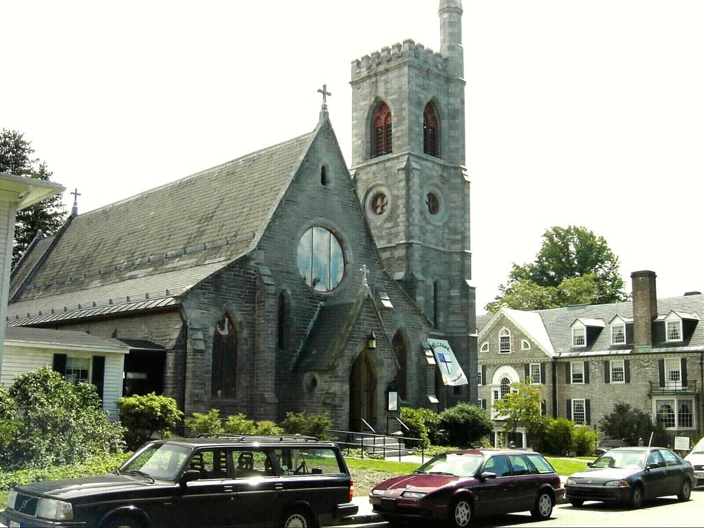 53 Pine Grove, Unit 53 Amherst, MA 01002 - Photo 23 of 24 a front view of a building with cars parked