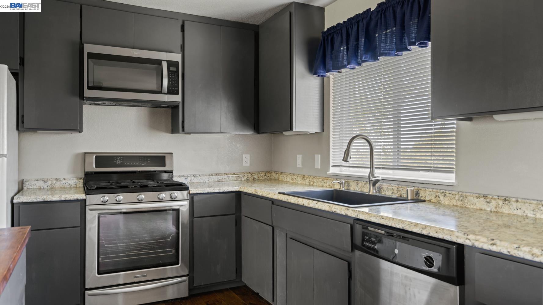 3710 Lakeview Drive Shingle Springs, CA 95682 - Photo 12 of 49 a kitchen with granite countertop cabinets stainless steel appliances and a sink