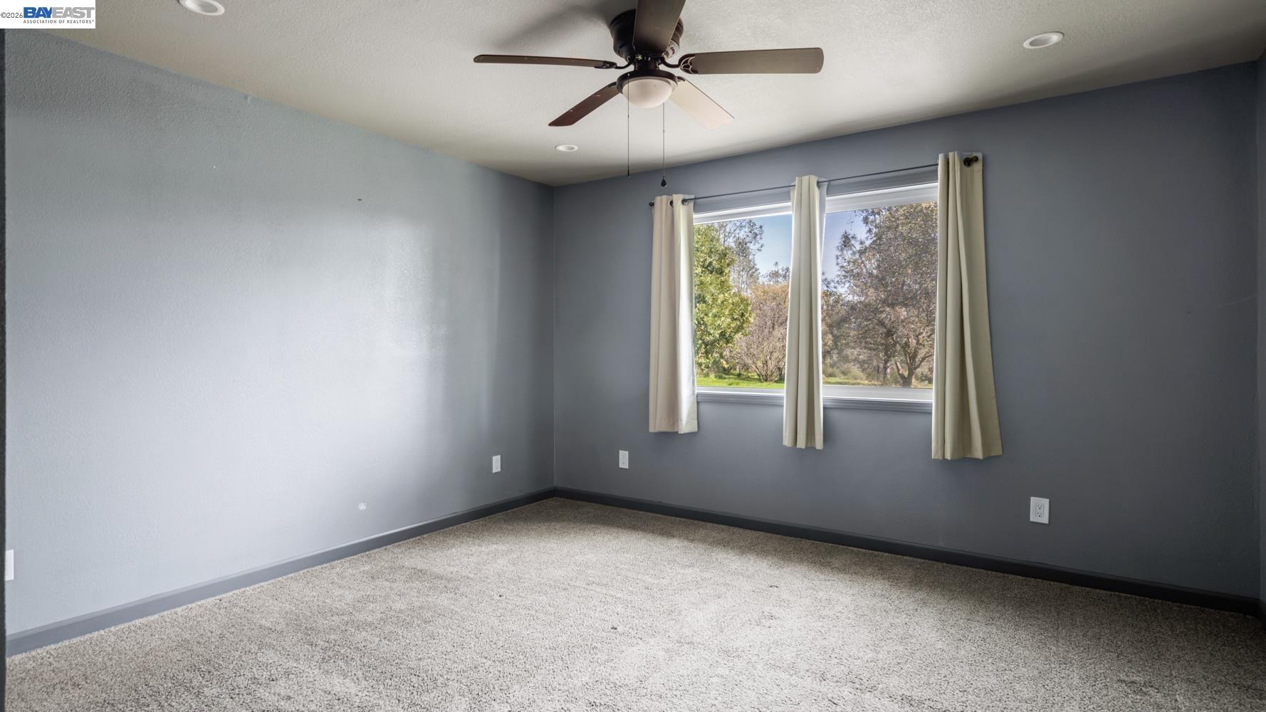 3710 Lakeview Drive Shingle Springs, CA 95682 - Photo 23 of 49 an empty room with windows and closet