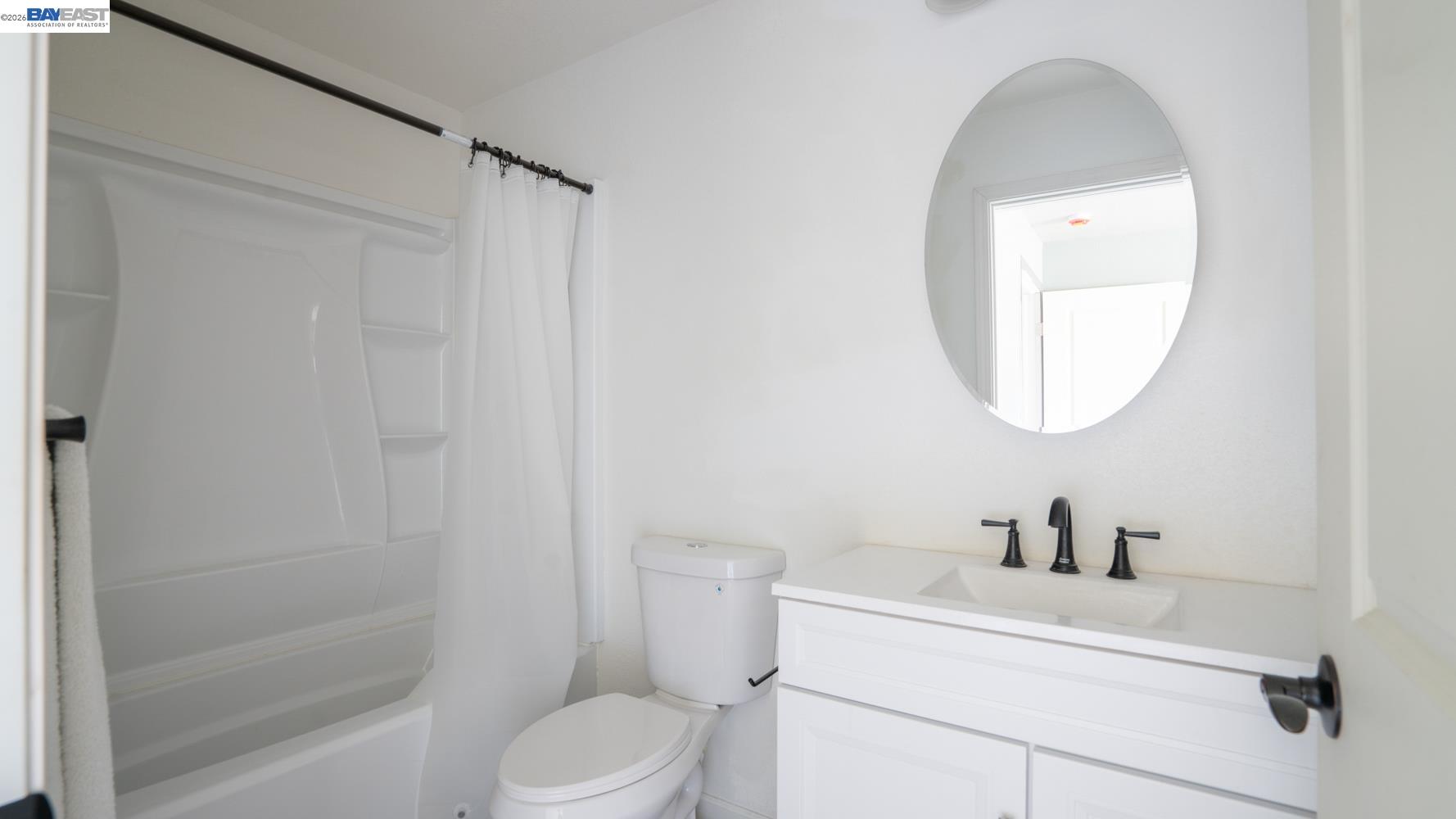3710 Lakeview Drive Shingle Springs, CA 95682 - Photo 25 of 49 a bathroom with a sink toilet and a mirror