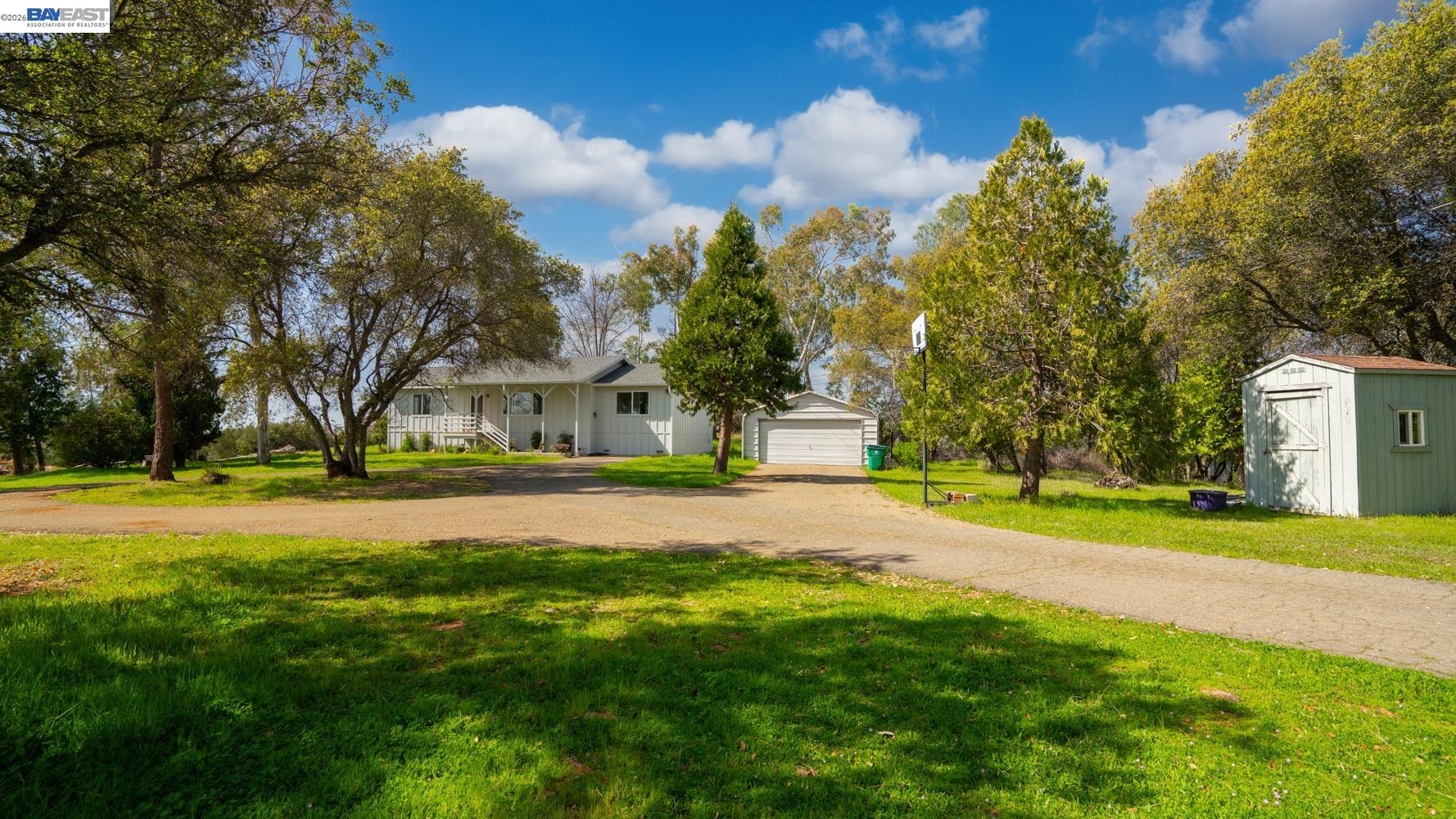 3710 Lakeview Drive Shingle Springs, CA 95682 - Photo 28 of 49 a view of a house with a big yard