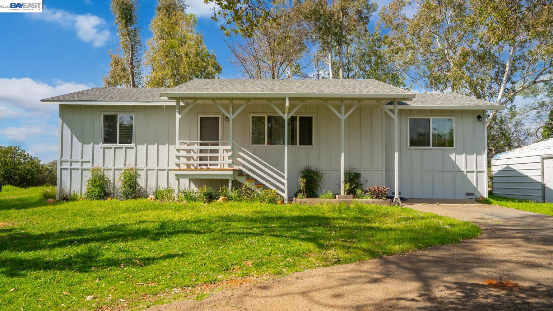 3710 Lakeview Drive Shingle Springs, CA 95682 - Photo 3 of 49 a front view of a house with a yard