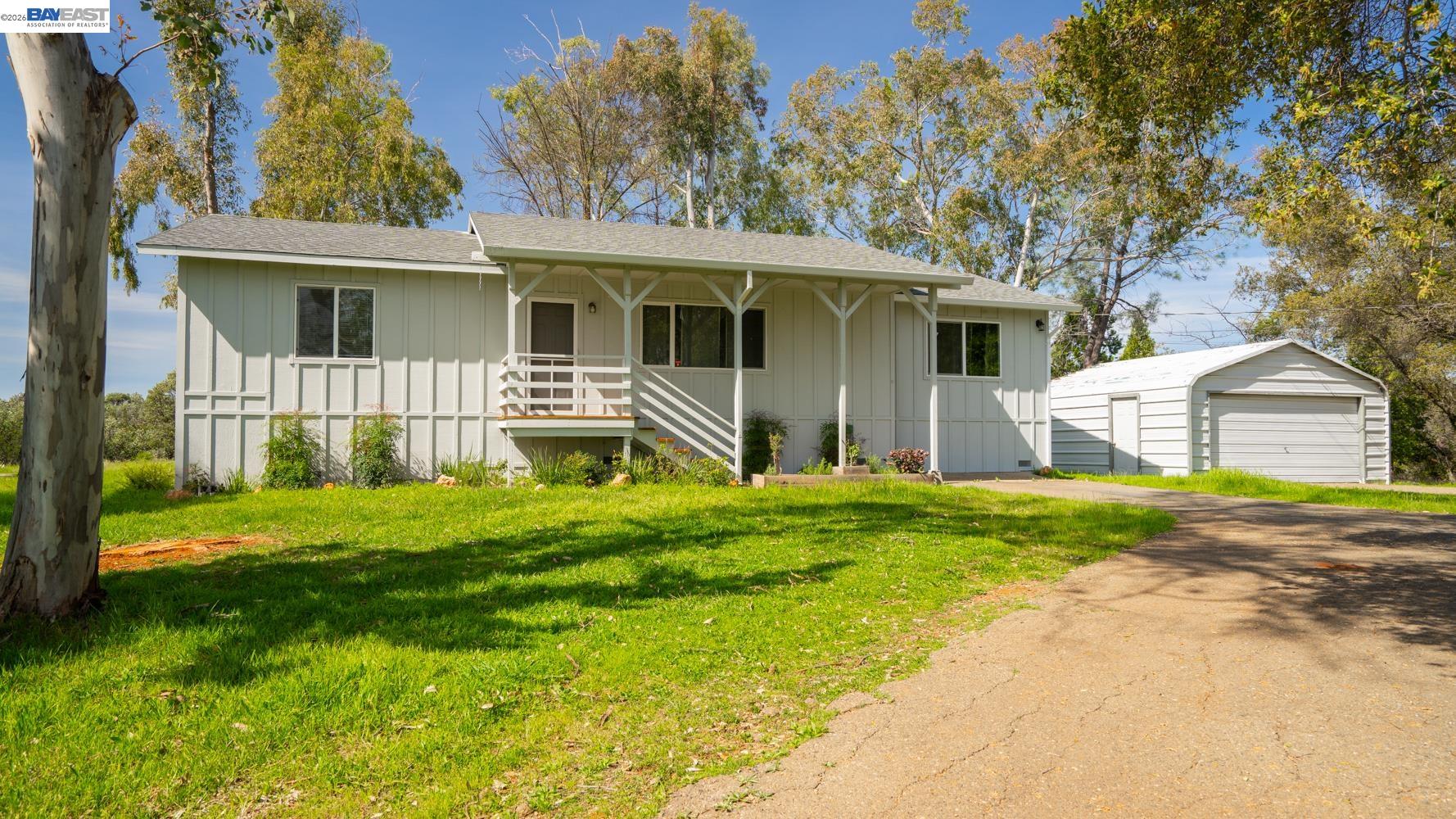 3710 Lakeview Drive Shingle Springs, CA 95682 - Photo 4 of 49 a front view of a house with a yard