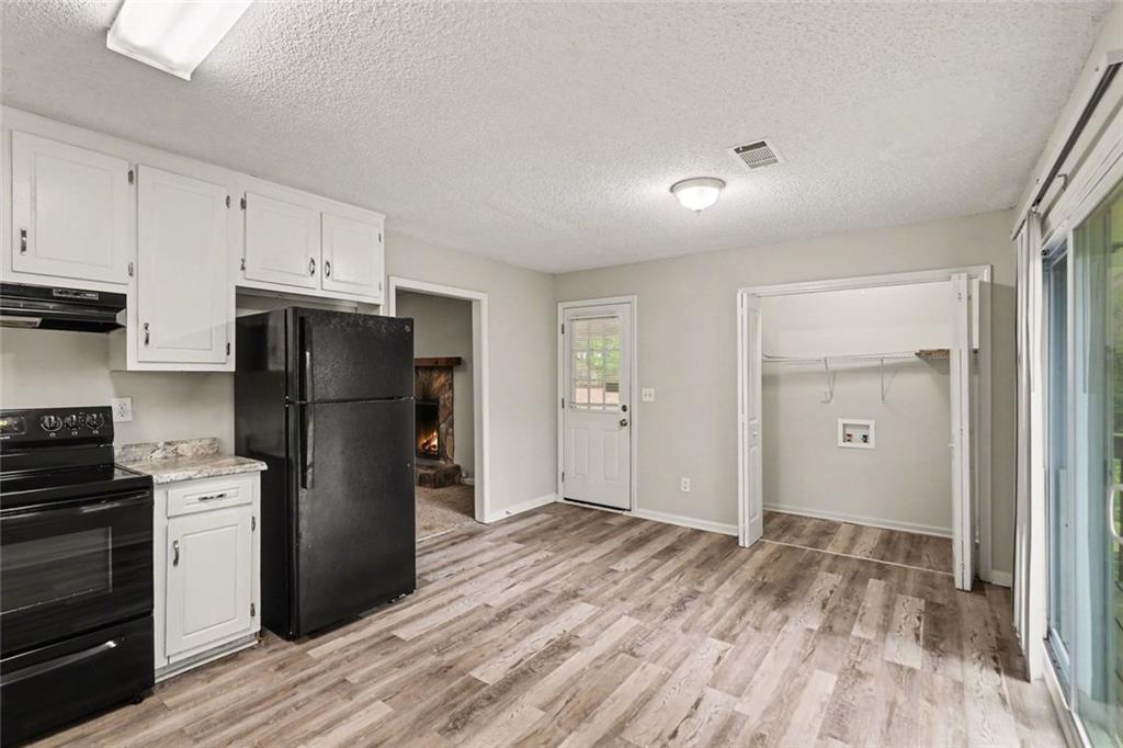 4500 Nebo Road Hiram, GA 30141 - Photo 11 of 15 a kitchen with a refrigerator and a stove