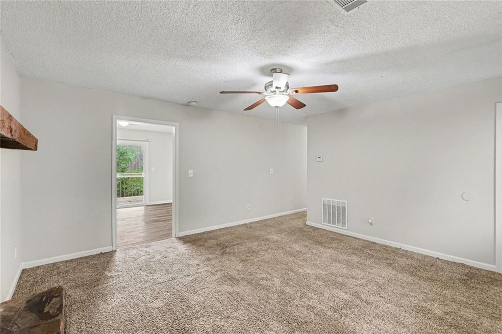 4500 Nebo Road Hiram, GA 30141 - Photo 14 of 15 wooden floor in an empty room with a window