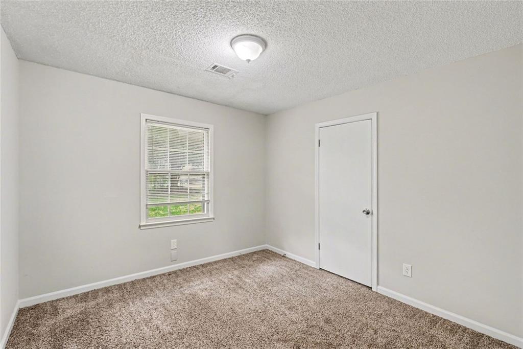 4500 Nebo Road Hiram, GA 30141 - Photo 4 of 15 an empty room with windows