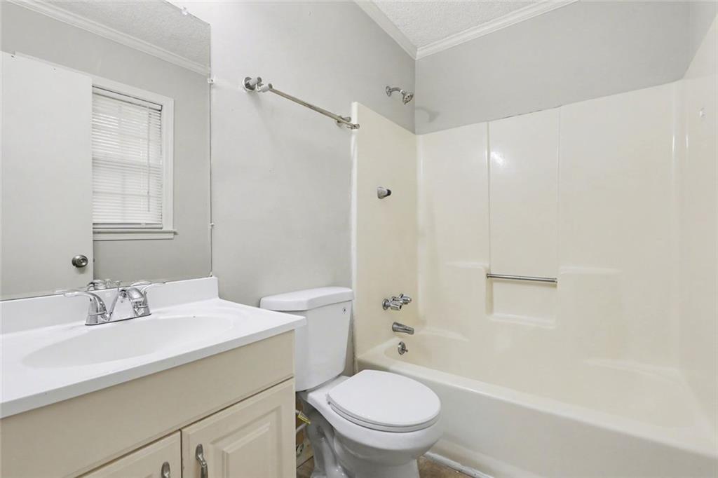 4500 Nebo Road Hiram, GA 30141 - Photo 8 of 15 a bathroom with a sink a toilet and shower