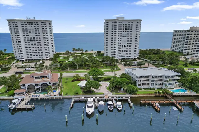 an aerial view of a house with a garden and plants