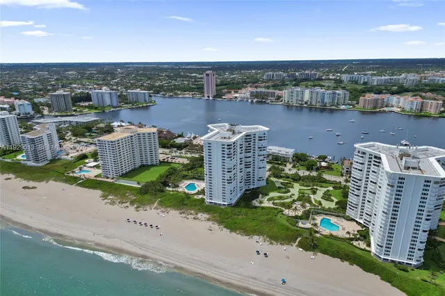 a backyard of a house with outdoor seating