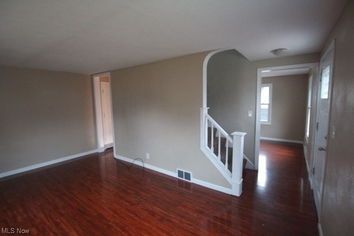 3606 Shelby Road Youngstown, OH 44511 - Photo 8 of 33 Empty room featuring dark hardwood / wood-style flooring