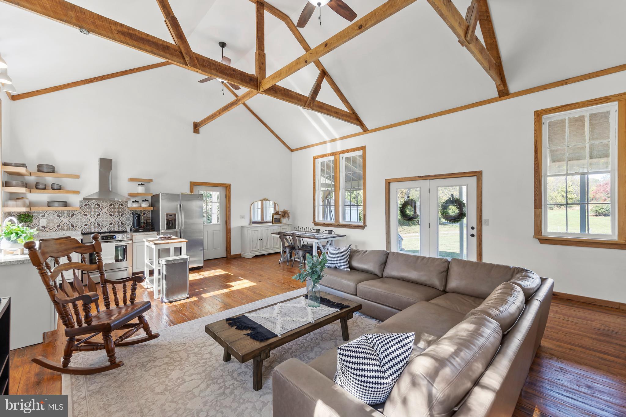 571 Rest Church Road Winchester, VA 22603 - Photo 14 of 45 a living room with furniture and a window