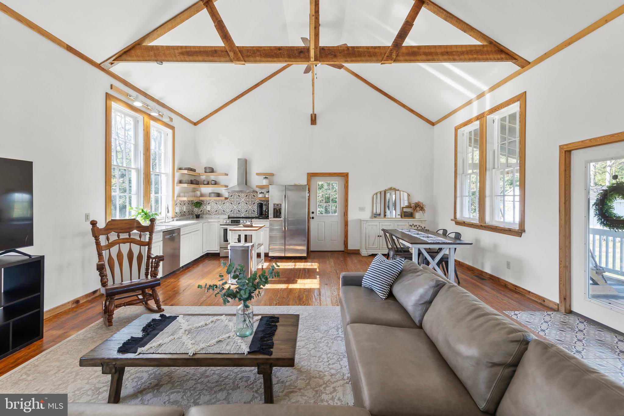 571 Rest Church Road Winchester, VA 22603 - Photo 18 of 45 a living room with furniture and a window