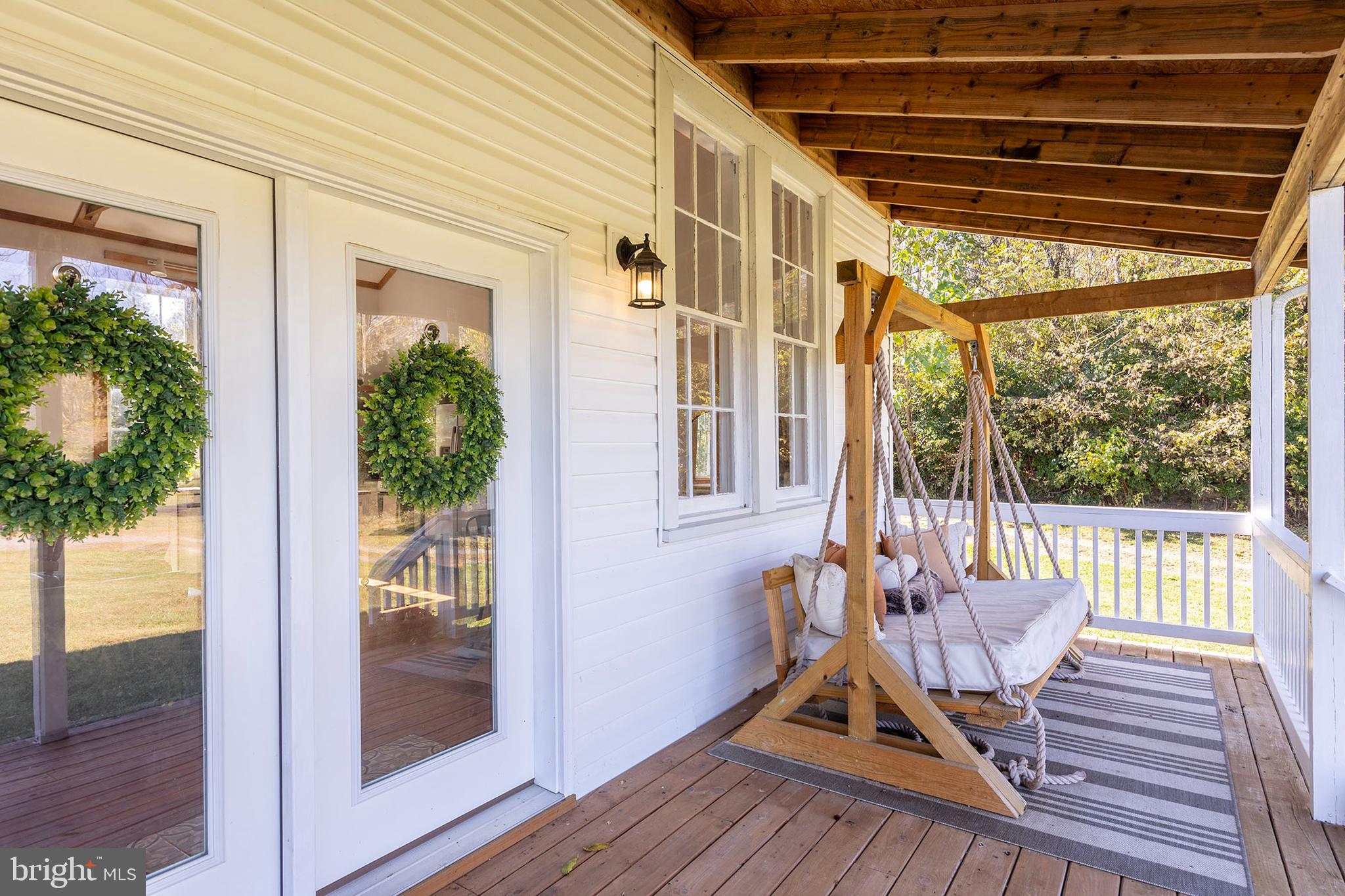 571 Rest Church Road Winchester, VA 22603 - Photo 2 of 45 a deck view with a seating space