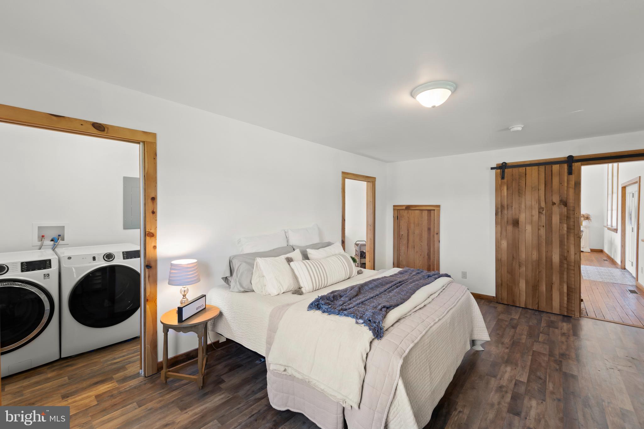 571 Rest Church Road Winchester, VA 22603 - Photo 21 of 45 a spacious bedroom with a bed and window