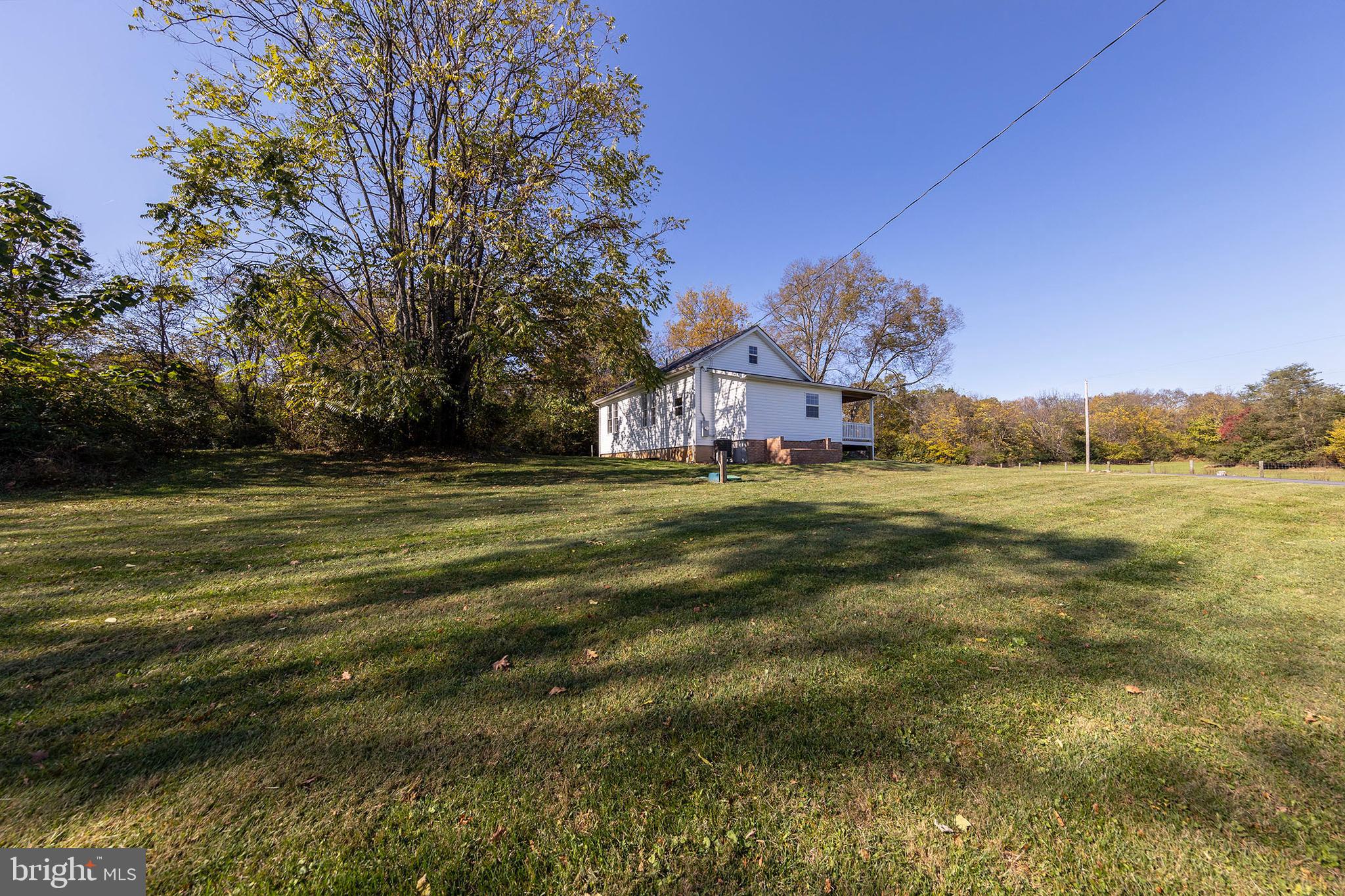 571 Rest Church Road Winchester, VA 22603 - Photo 37 of 45 a view of a big yard with large trees