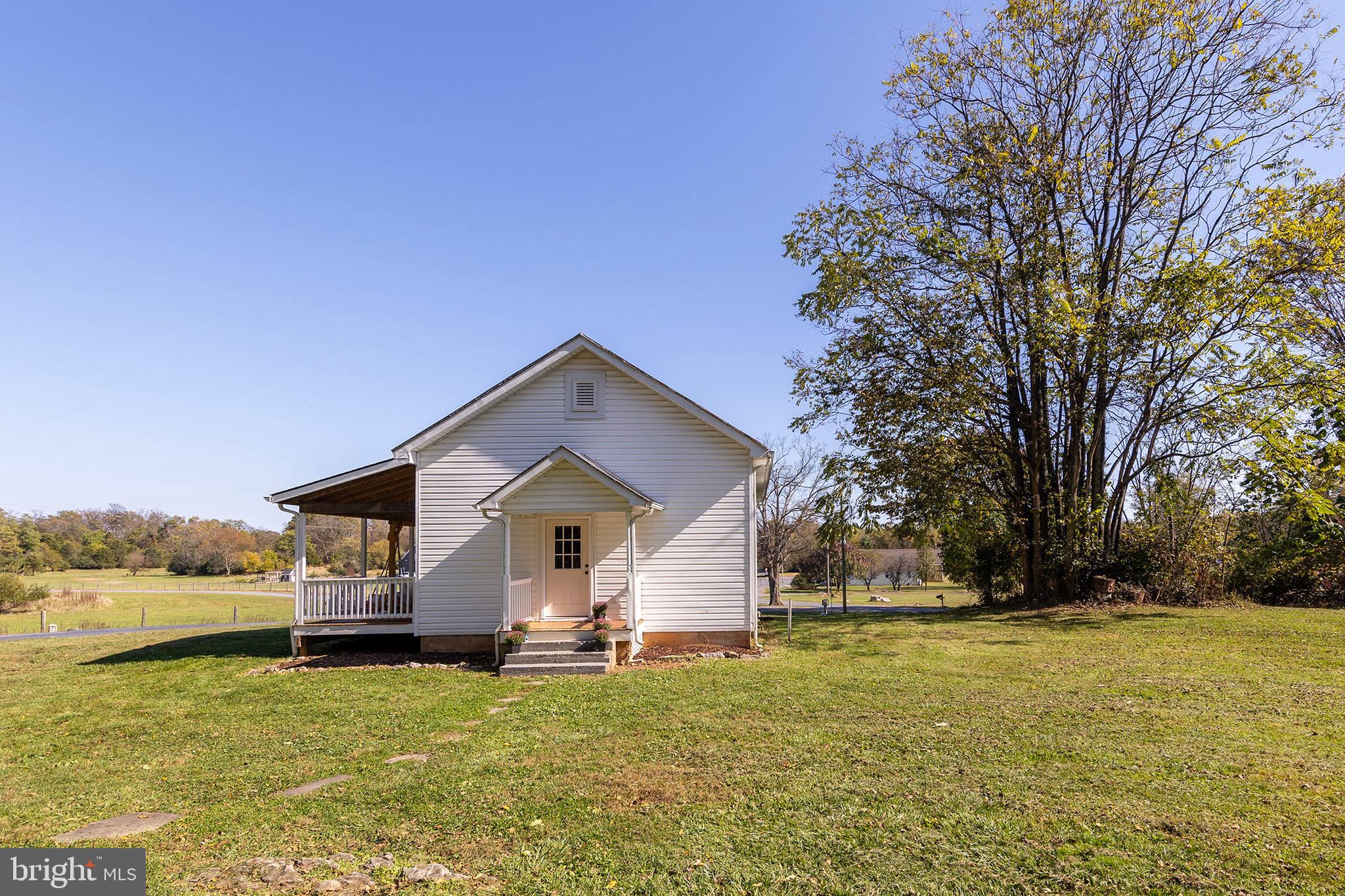 571 Rest Church Road Winchester, VA 22603 - Photo 41 of 45 a view of a house with backyard and tree s