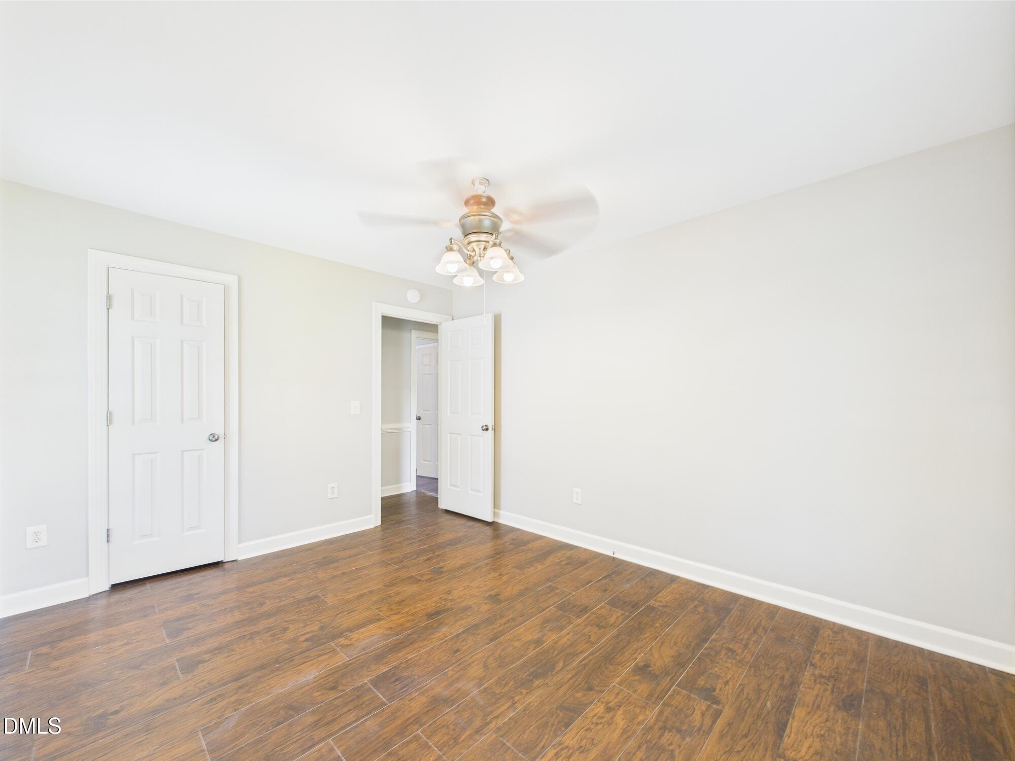 10917 Fanny Brown Road Raleigh, NC 27603 - Photo 33 of 54 a view of an empty room with wooden floor