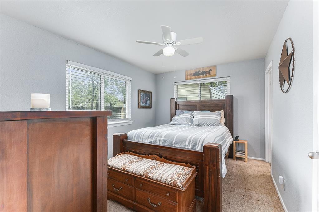 6608 Swanee Court Watauga, TX 76148 - Photo 18 of 30 a bedroom with a bed and a window