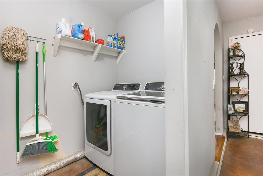 6608 Swanee Court Watauga, TX 76148 - Photo 24 of 30 a utility room with dryer and washer