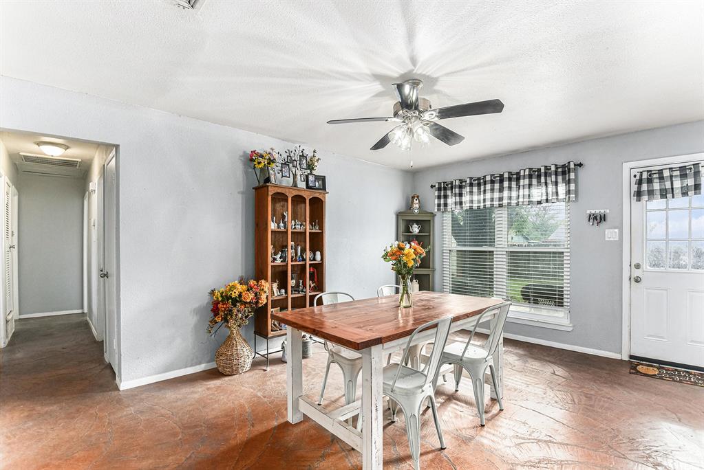 6608 Swanee Court Watauga, TX 76148 - Photo 10 of 30 a view of a dining room with furniture window and outside view