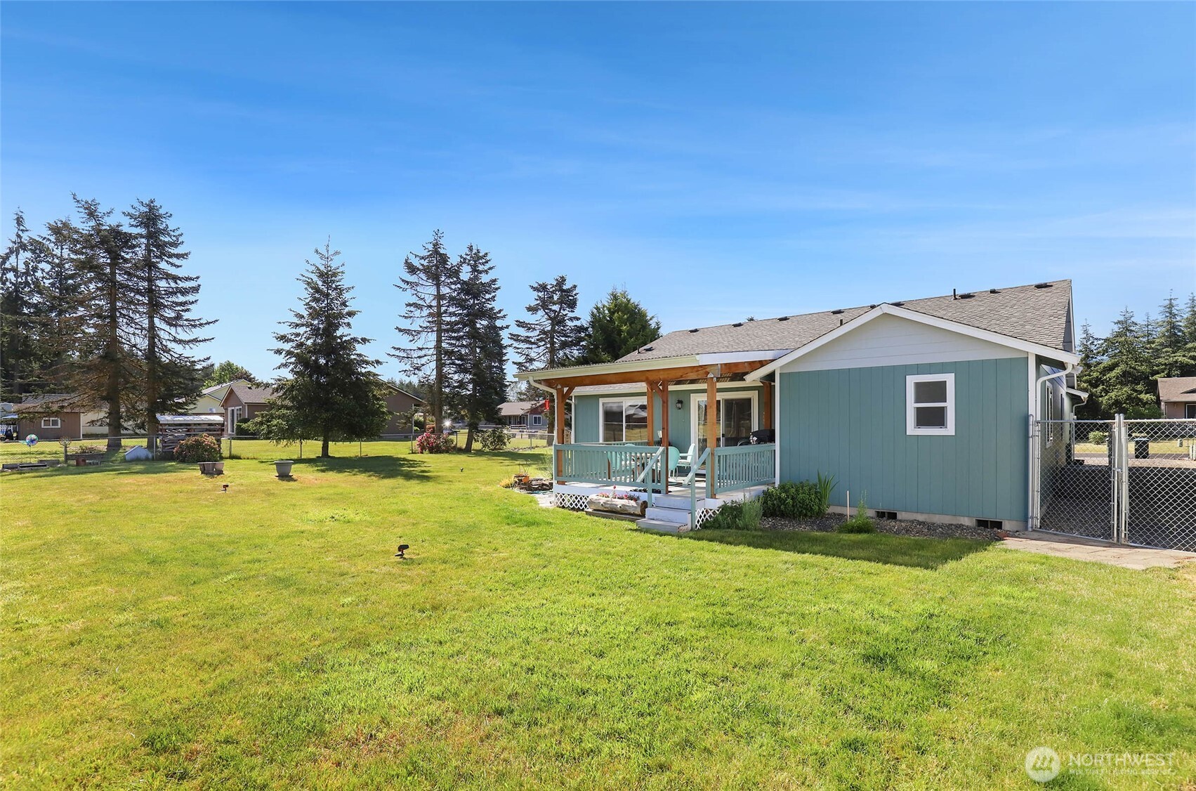 8008 188th Avenue Southwest Rochester, WA 98579 - Photo 39 of 40 a view of a house with a yard