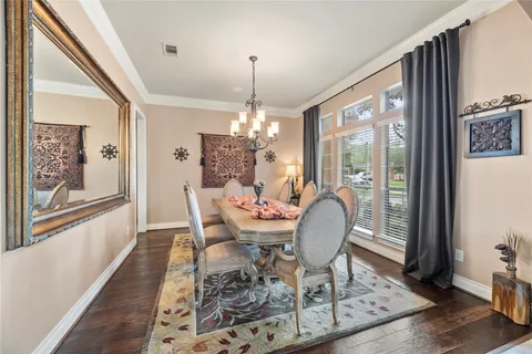 a view of a livingroom with furniture and a window