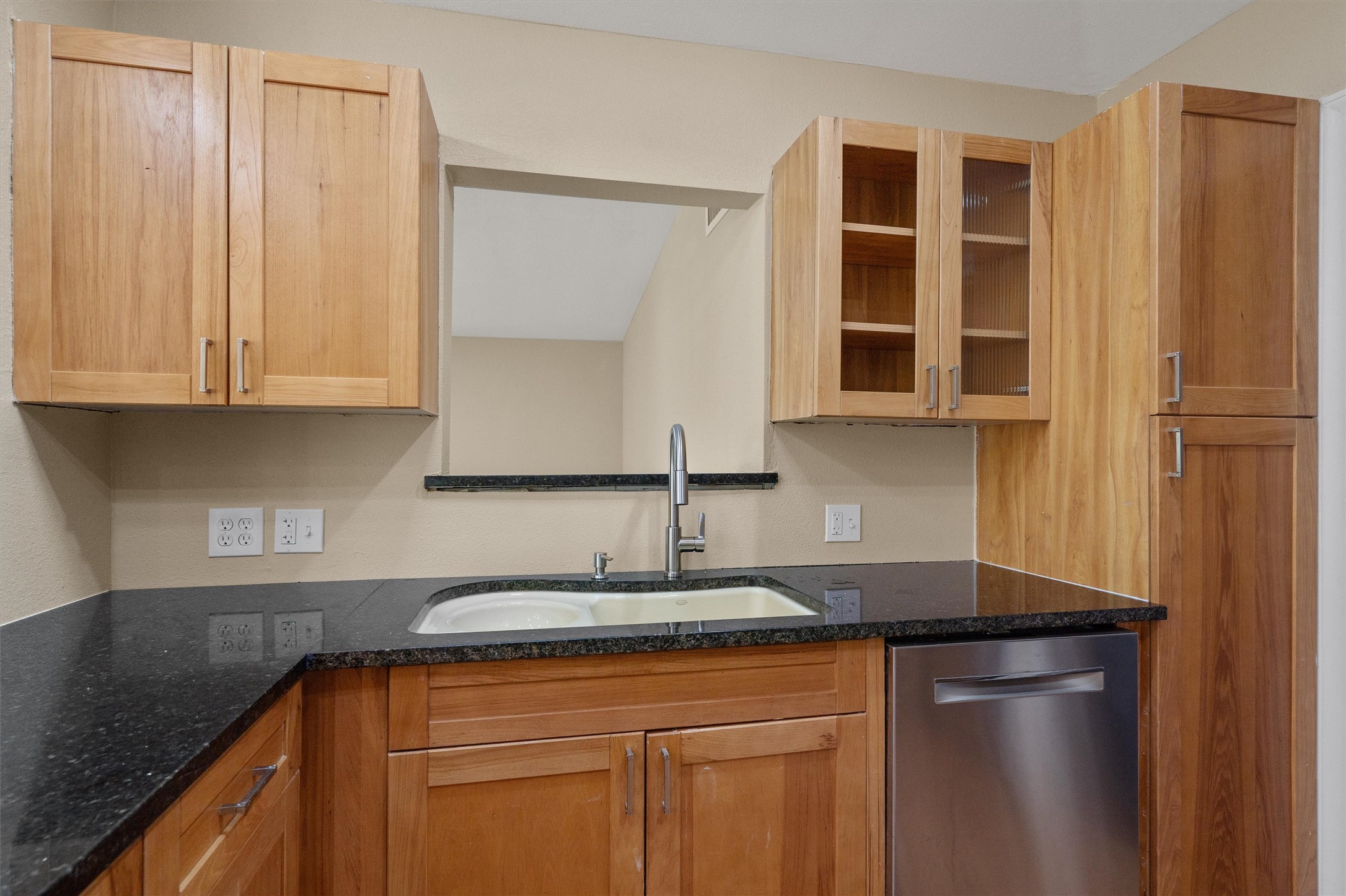 400 East Monroe Street Austin, TX 78704 - Photo 15 of 39 a kitchen with stainless steel appliances granite countertop a sink and a granite counter top