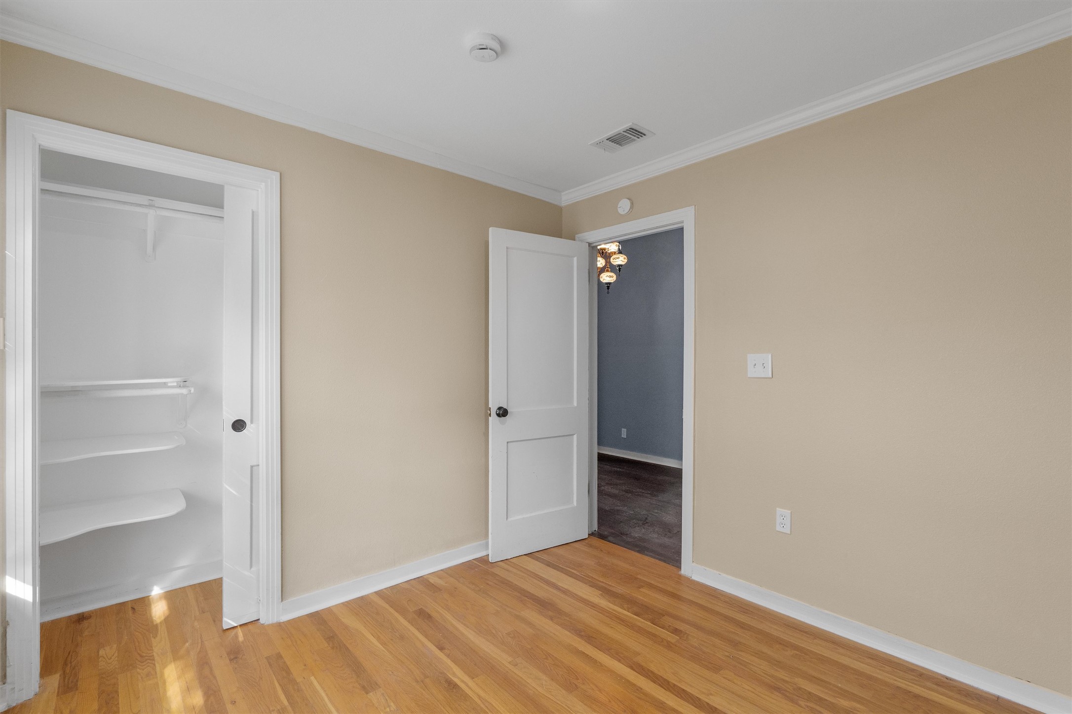 400 East Monroe Street Austin, TX 78704 - Photo 25 of 39 a view of an empty room with closet and a window