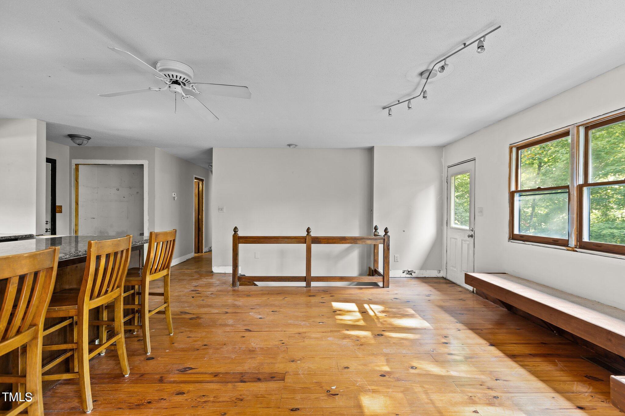 5900 Ebenezer Church Road Raleigh, NC 27612 - Photo 30 of 71 a view of a livingroom with furniture and window