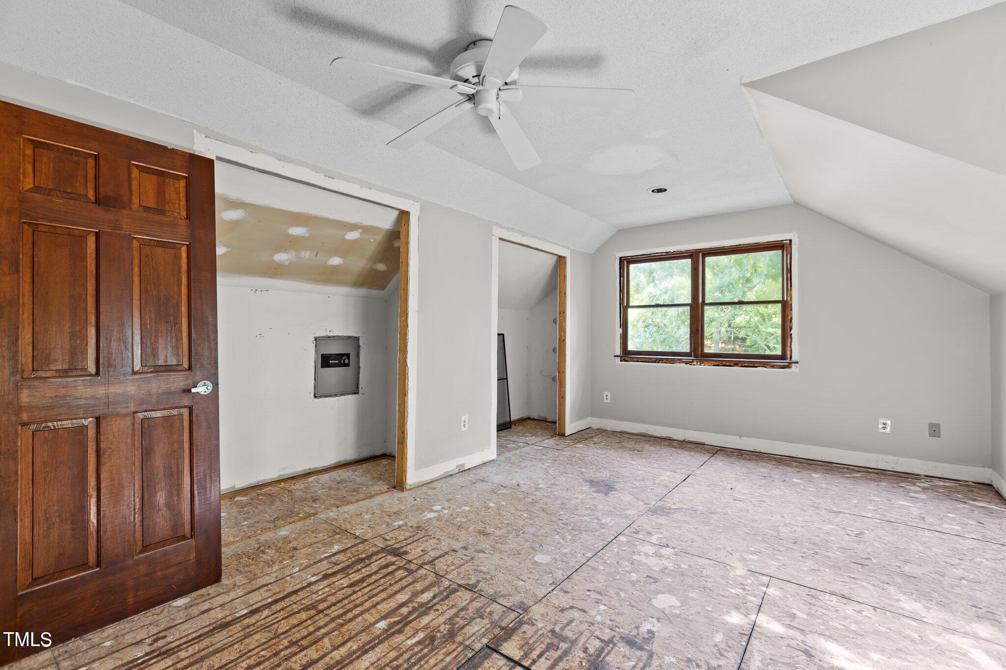 5900 Ebenezer Church Road Raleigh, NC 27612 - Photo 36 of 71 an empty room with windows and closet