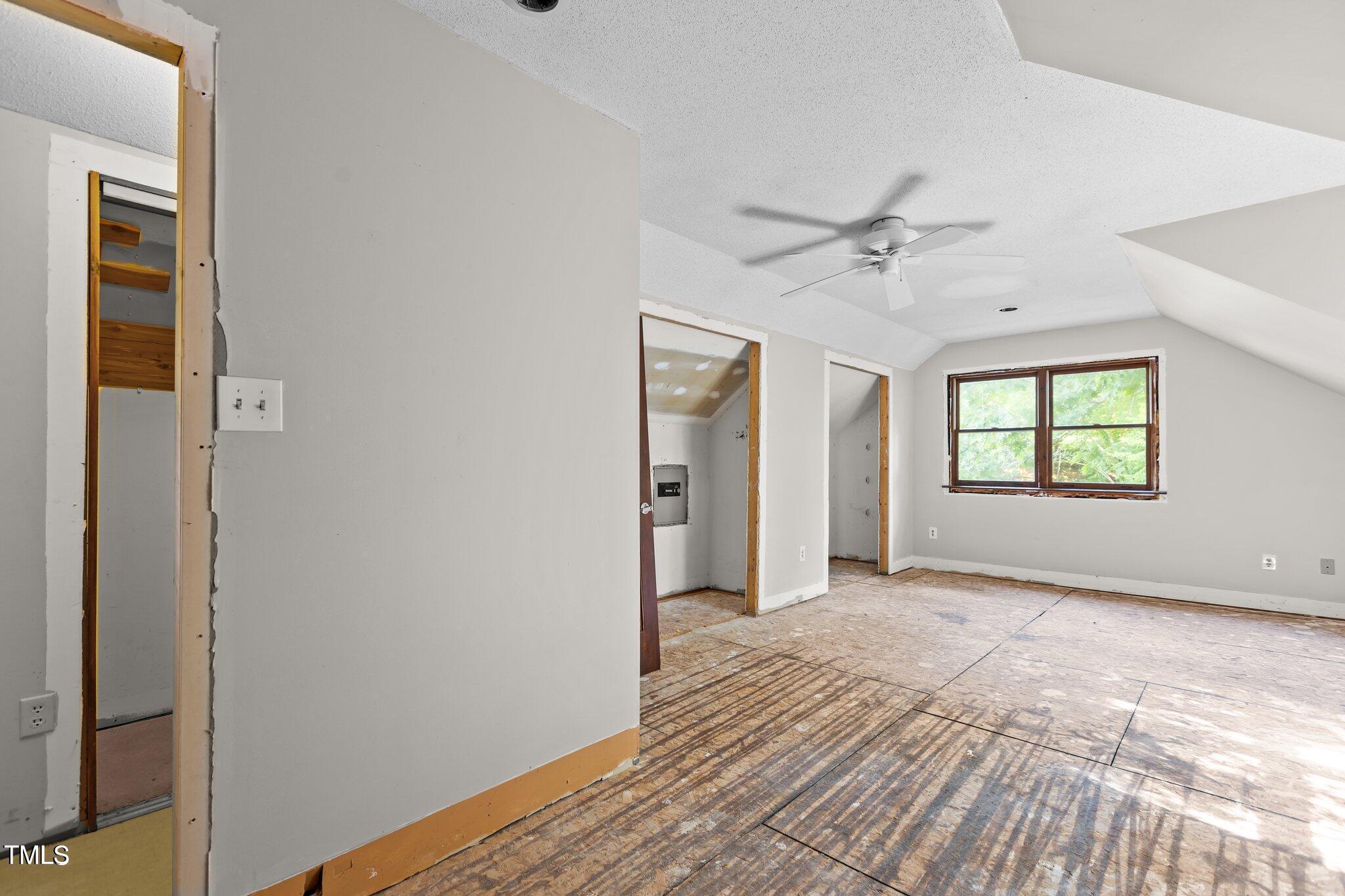 5900 Ebenezer Church Road Raleigh, NC 27612 - Photo 39 of 71 wooden floor in an empty room with a window
