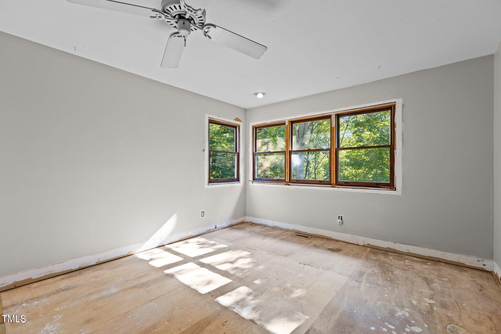5900 Ebenezer Church Road Raleigh, NC 27612 - Photo 42 of 71 an empty room with a window