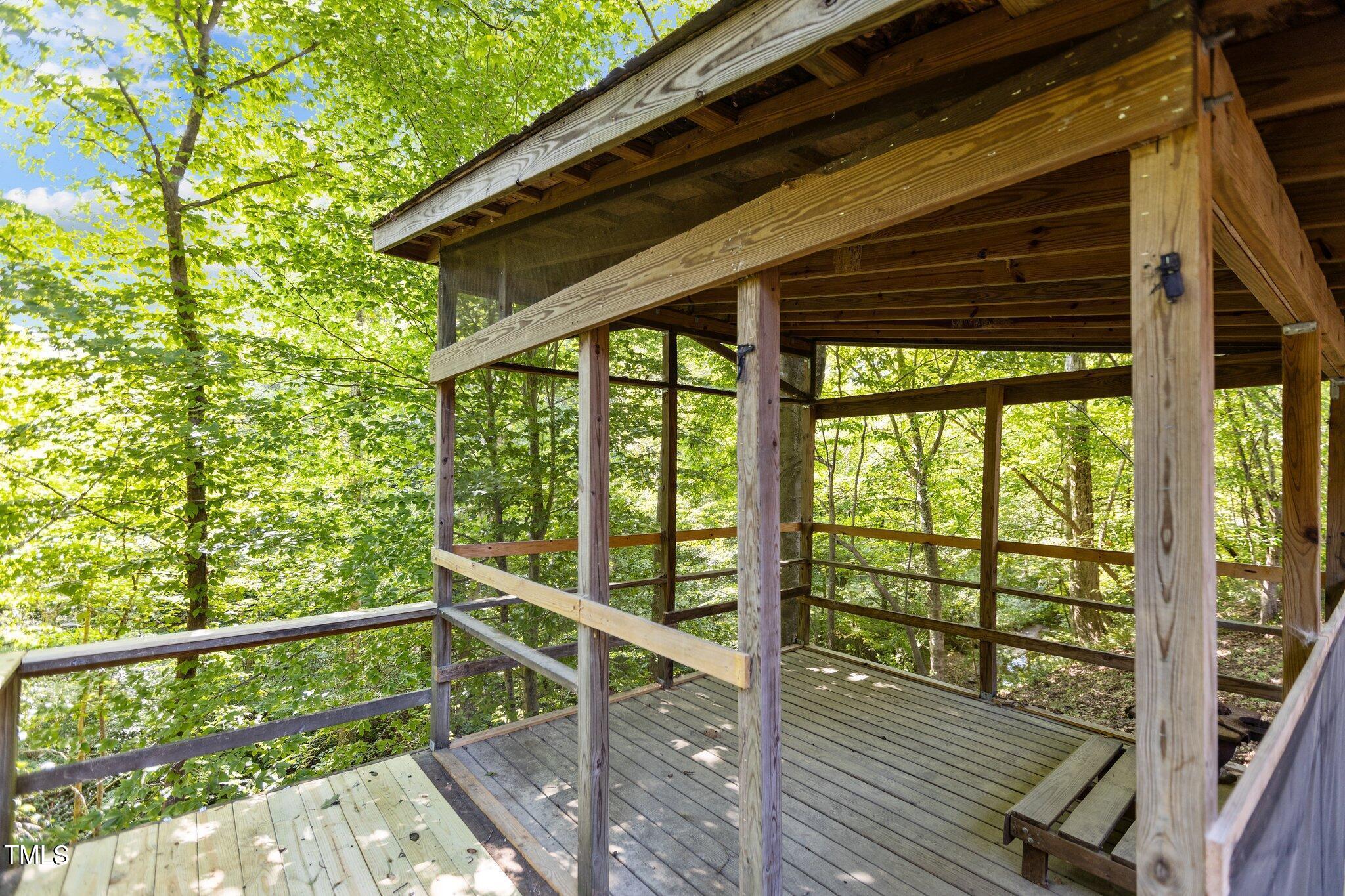 5900 Ebenezer Church Road Raleigh, NC 27612 - Photo 56 of 71 a view of a balcony with wooden floor