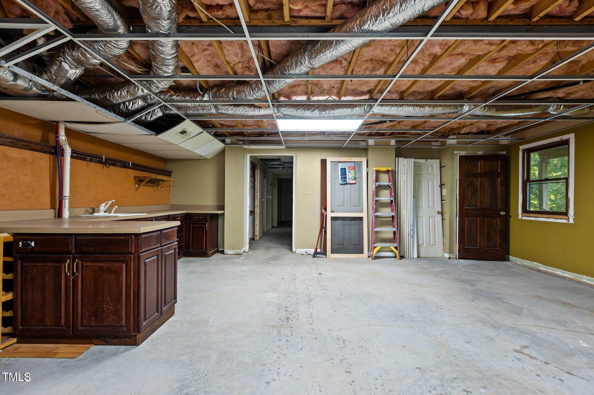 5900 Ebenezer Church Road Raleigh, NC 27612 - Photo 60 of 71 a view of a room with wooden walls