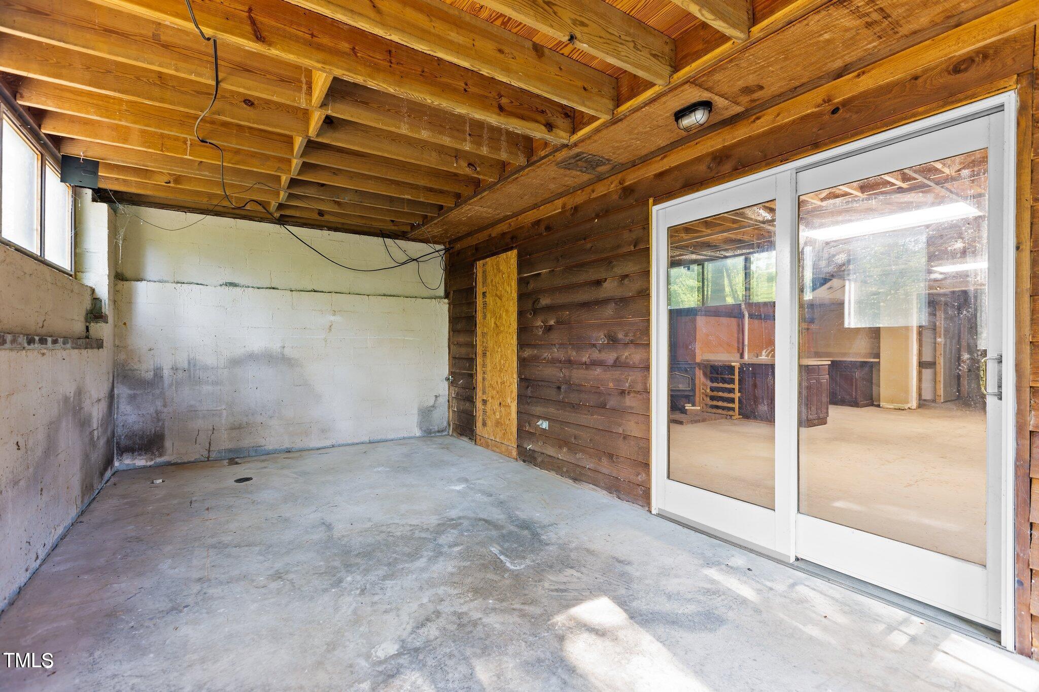 5900 Ebenezer Church Road Raleigh, NC 27612 - Photo 62 of 71 a view of empty room with wooden floor