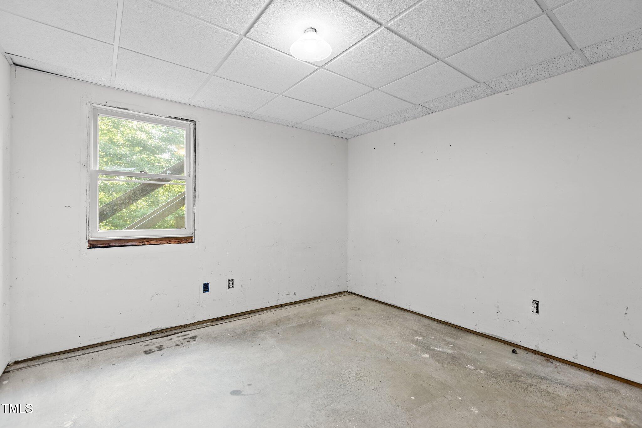 5900 Ebenezer Church Road Raleigh, NC 27612 - Photo 64 of 71 a view of an empty room with a window