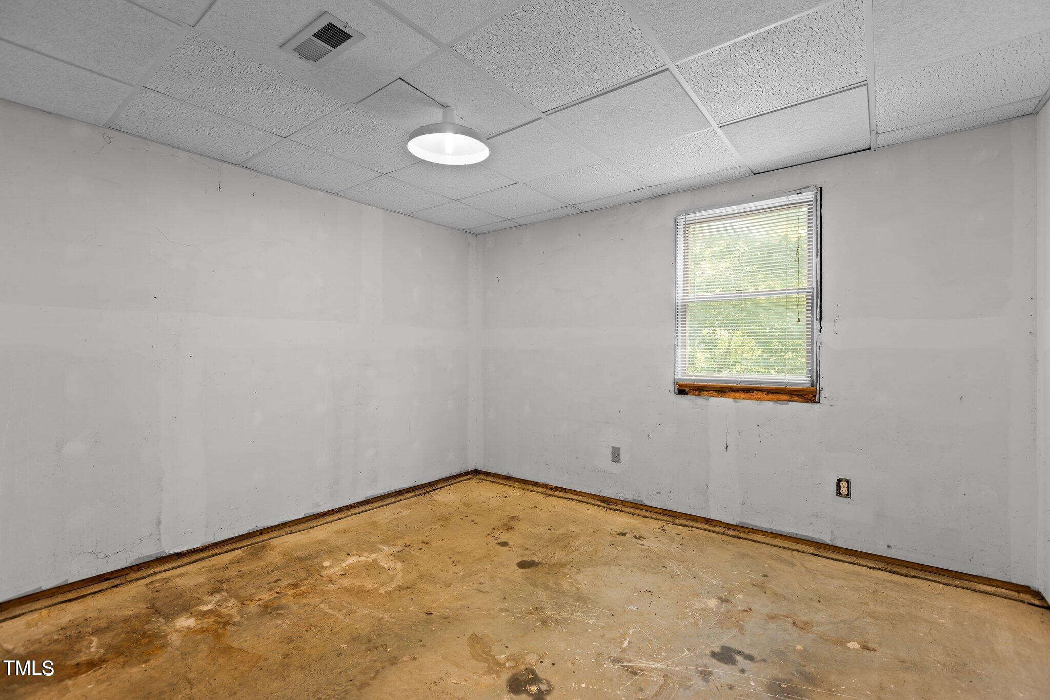 5900 Ebenezer Church Road Raleigh, NC 27612 - Photo 65 of 71 an empty room with a window