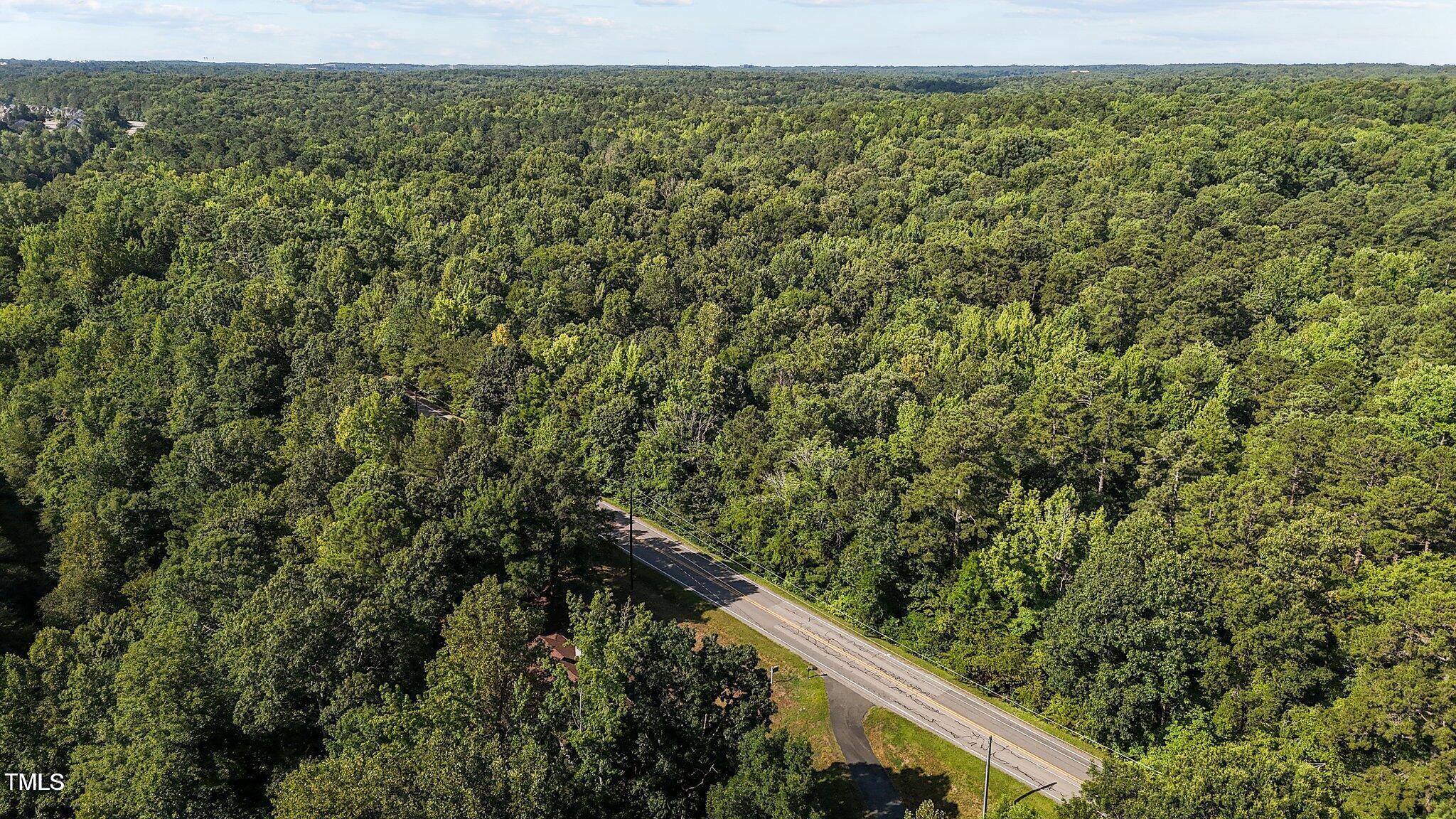 5900 Ebenezer Church Road Raleigh, NC 27612 - Photo 6 of 71 a view of an outdoor space with a lake view