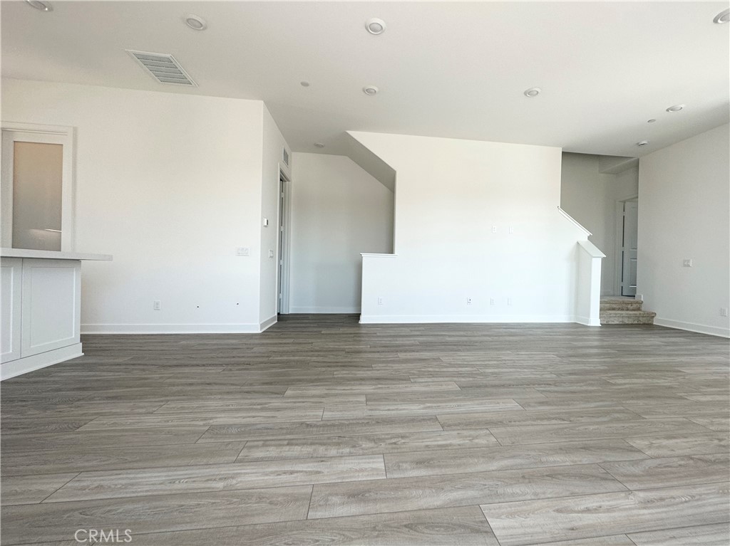 322 Tank Irvine, CA 92618 - Photo 13 of 43 a view of empty room with wooden floor
