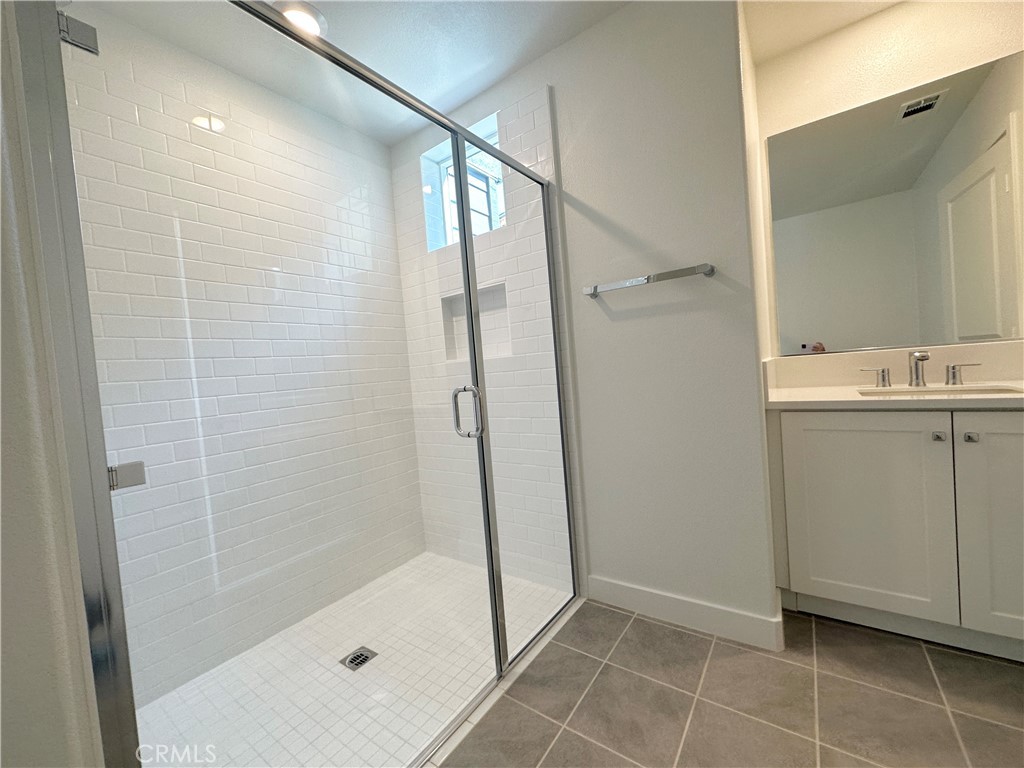 322 Tank Irvine, CA 92618 - Photo 5 of 43 a bathroom with a shower and a sink