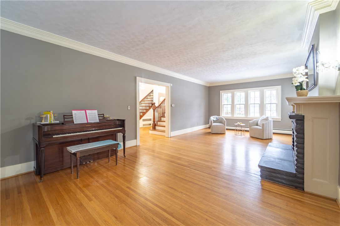 101 Thackery Road Brighton, NY 14610 - Photo 14 of 45 An additional sitting area complements the main li