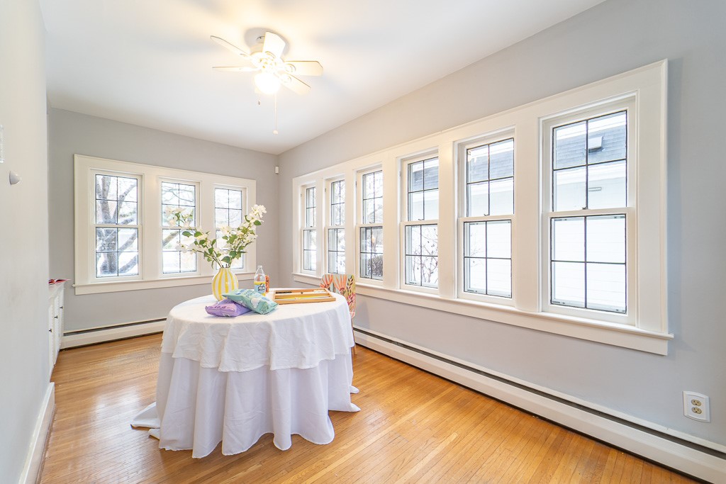 101 Thackery Road Brighton, NY 14610 - Photo 16 of 45 Walls of windows allow light to stream in year rou