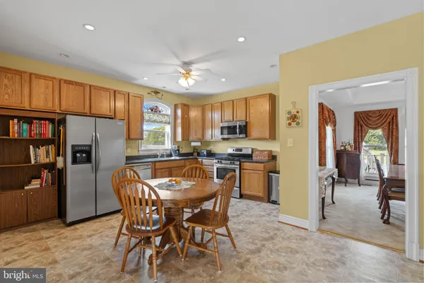 a view of a dining room with furniture