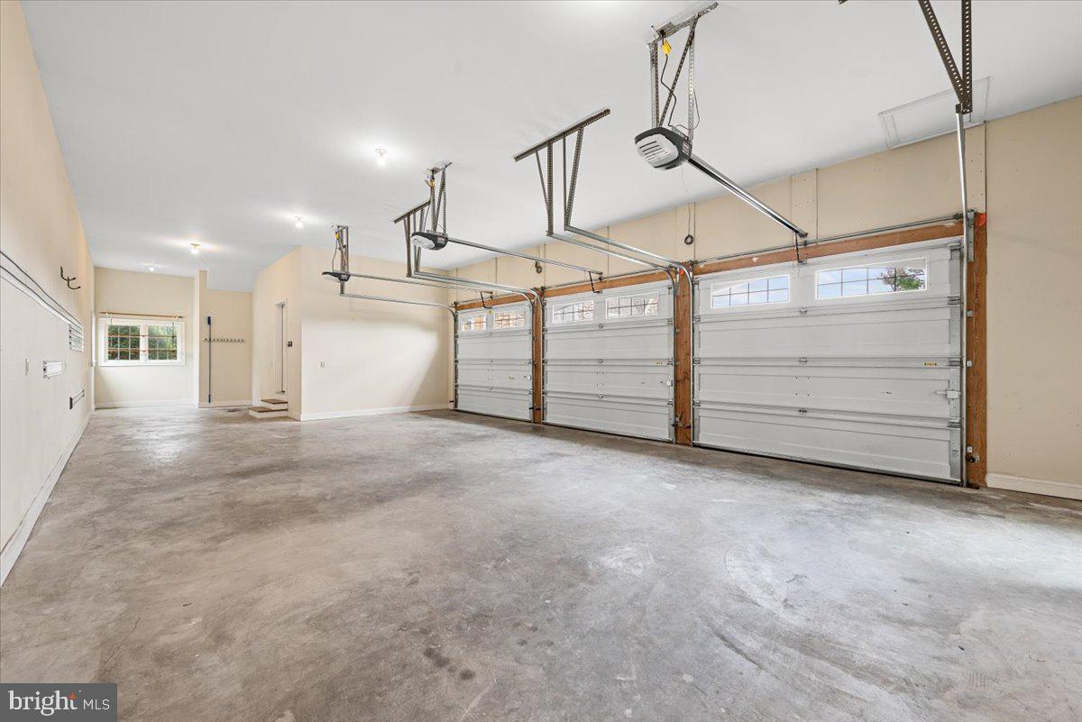 730 Miller Road Winchester, VA 22602 - Photo 29 of 52 Large oversized 3-car garage with work area space