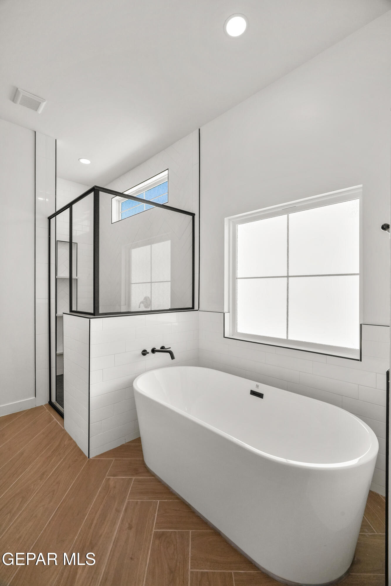 15225 Expectation El Paso, TX 79938 - Photo 31 of 38 a white bath tub sitting next to a window