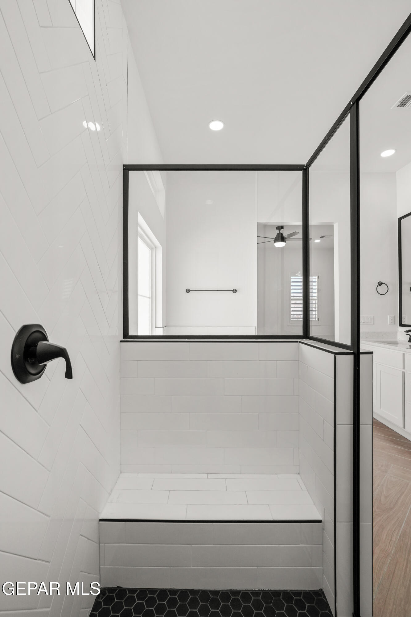 15225 Expectation El Paso, TX 79938 - Photo 33 of 38 a bathroom with a shower and a glass door