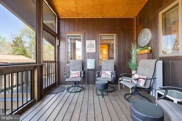 a view of a balcony and front door