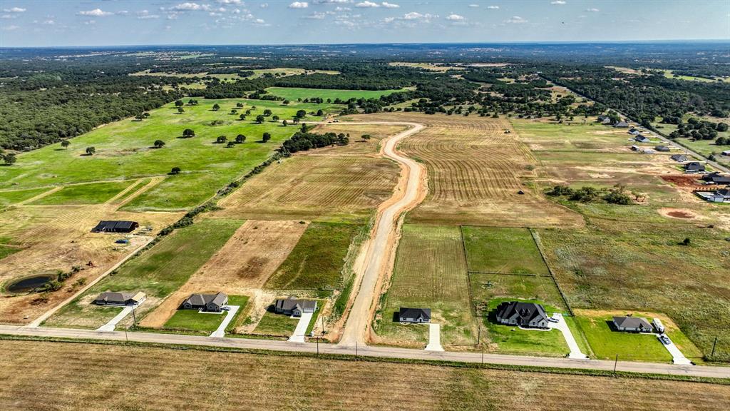 Lot 10 Quarter Loop Poolville, TX 76487 - Photo 7 of 10 a view of a swimming pool