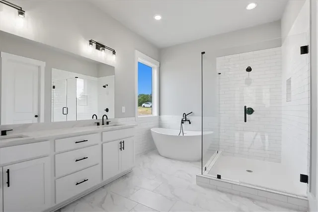 a bathroom with a sink and cabinets